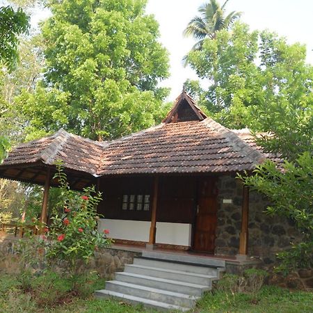 Quiet By The River- Cgh Earth Thodakayam Exteriör bild