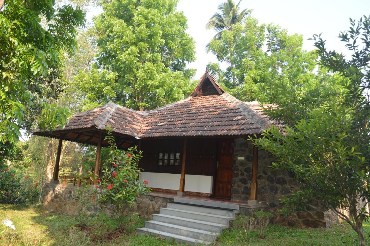 Quiet By The River- Cgh Earth Thodakayam Exteriör bild